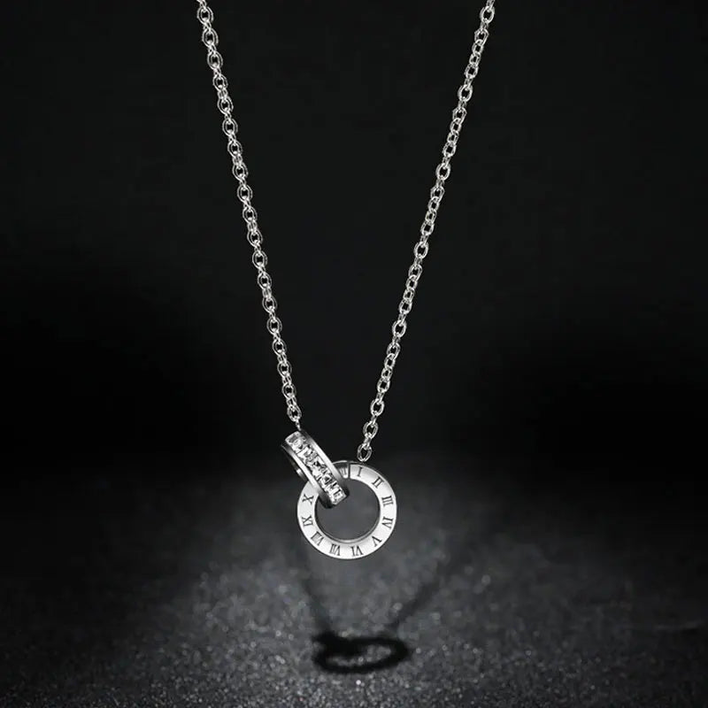 CYNTHIA – Roman Numeral Charm Necklace