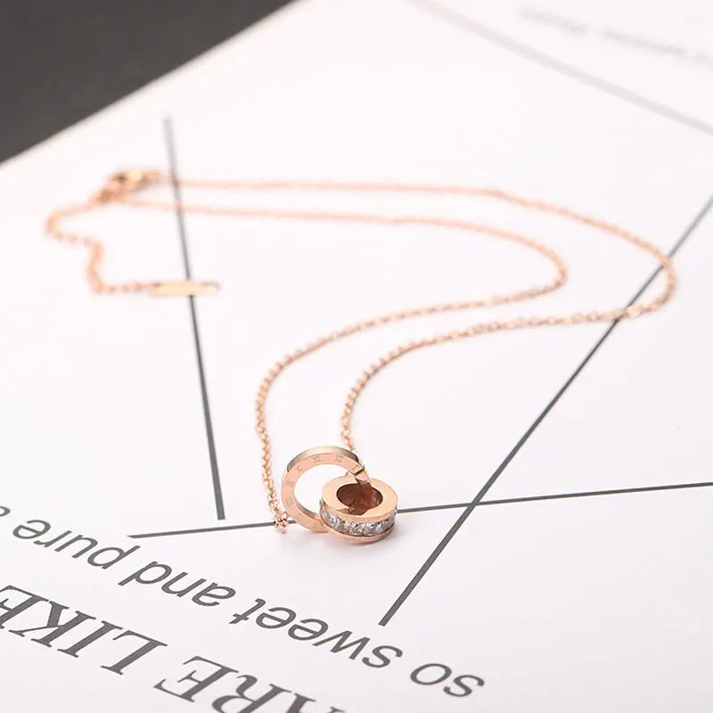 CYNTHIA – Roman Numeral Charm Necklace